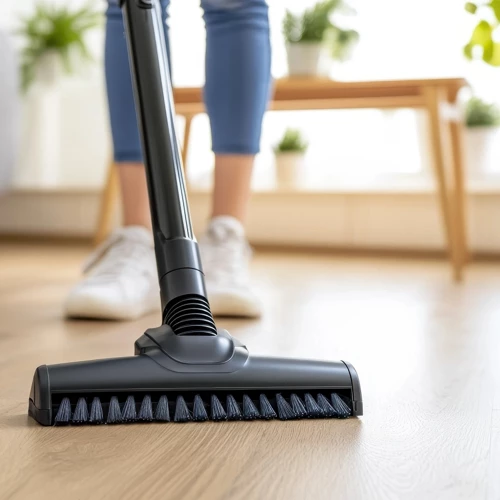 Cleaning a hardwood floor in a bright home