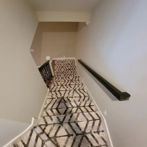 Carpeted stairs by McCools Flooring