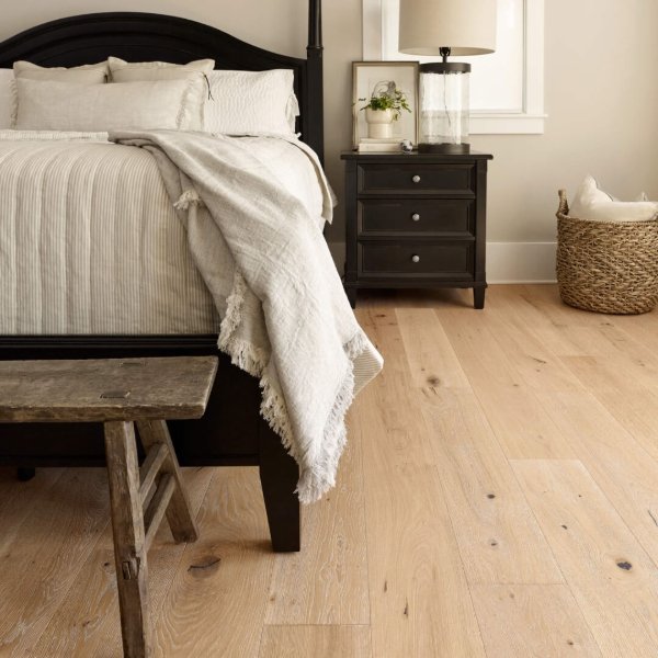 Timeless hardwood flooring in a classic bedroom