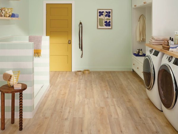 Family home with wood flooring in a laundry room